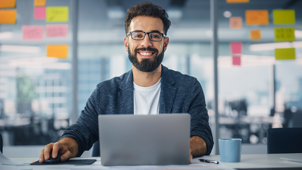 Data science employee wrorking on his laptop