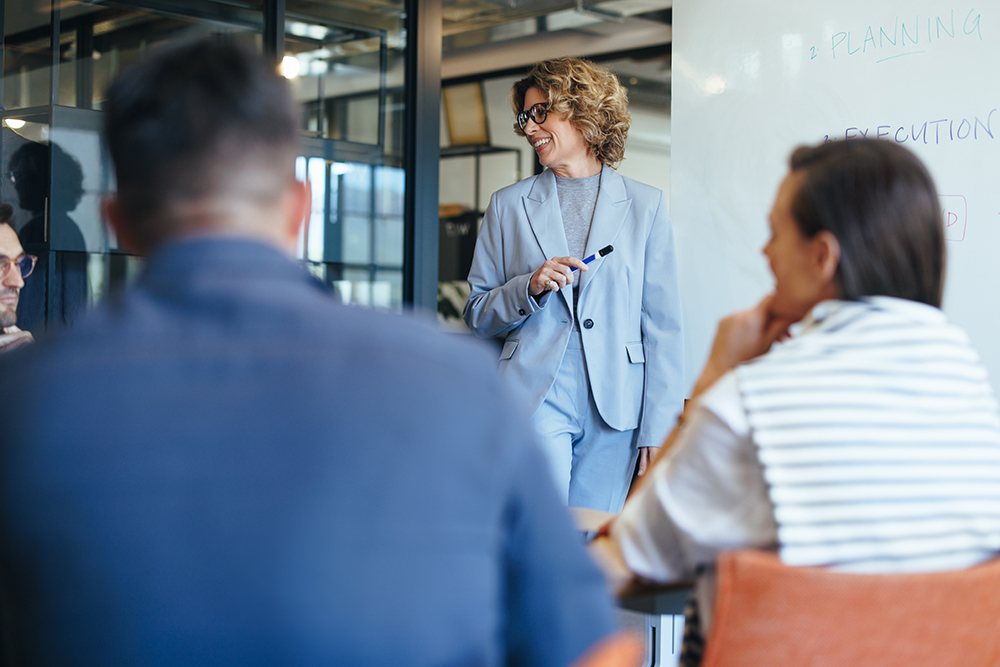 Business colleagues having a discussion in a presentation